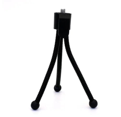 Mini tripod with universal ball head folded to 110mm size next to smartphone showing compatibility