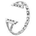 Diamond-studded stainless steel watch strap in five colour options on a watch.