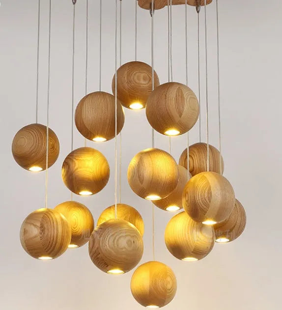 Nordic wood ball chandelier with adjustable height mechanism and solid wood construction for living room lighting