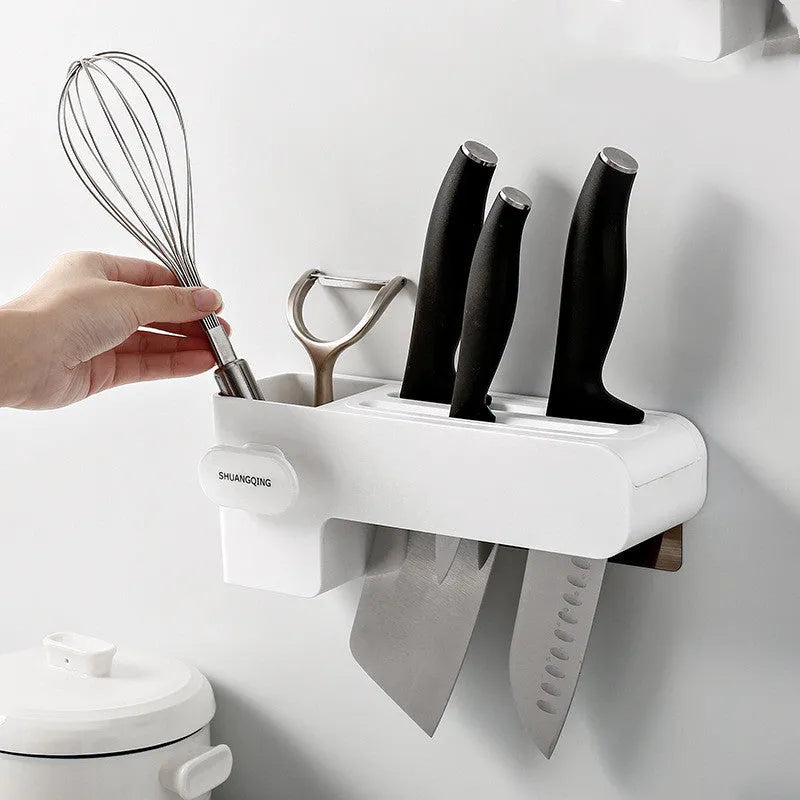 Modern white plastic kitchen knife rack with non-slip strip for wall or drawer mounting.