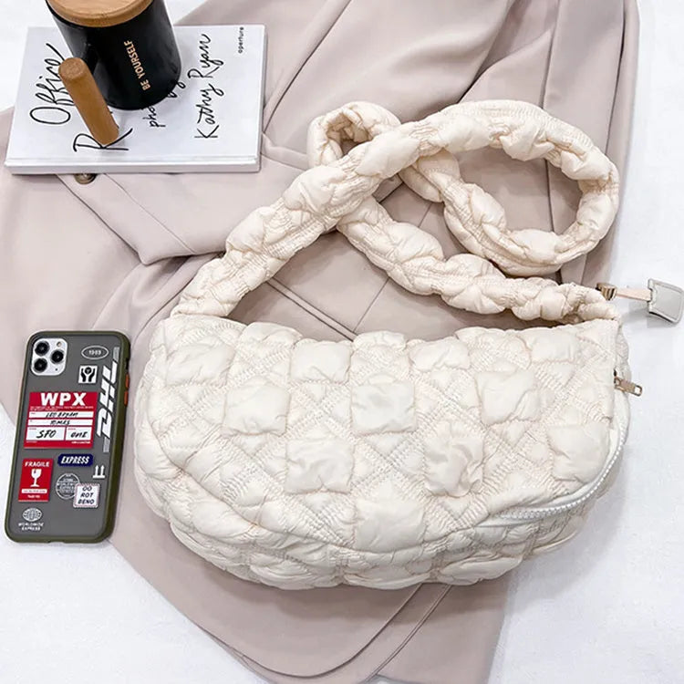 Women's nylon underarm bag in beige colour showing 35cm width and adjustable 120cm shoulder strap