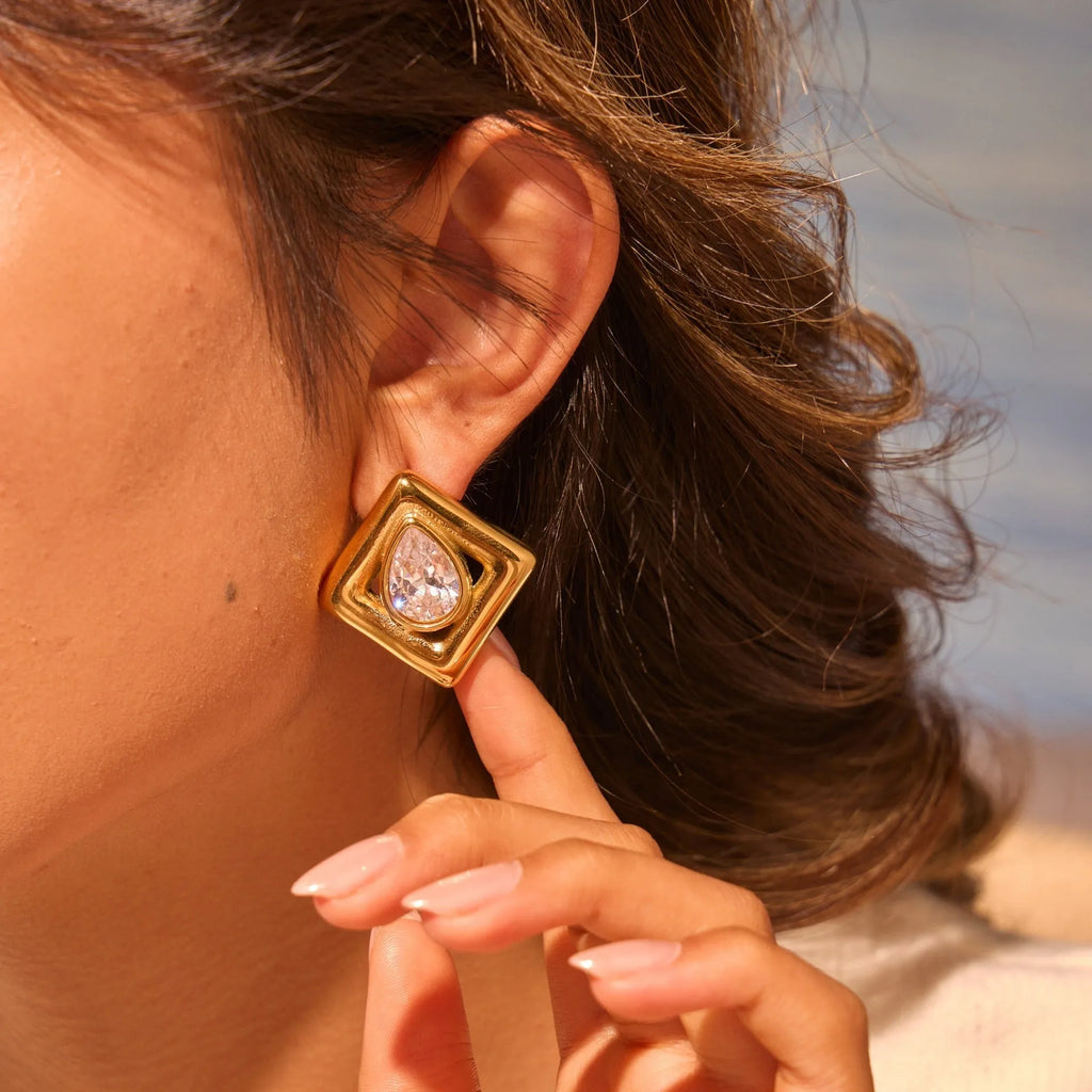Gold geometric stud earrings with inlaid water drop zircon stones
