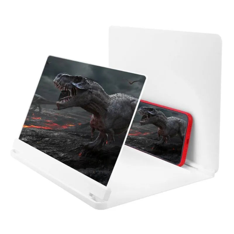 White 9-inch phone screen amplifier with plexiglass lens on a fibreboard base next to a smartphone.