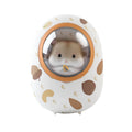 White hamster hand warmer power bank with space capsule design showing heating controls and USB ports