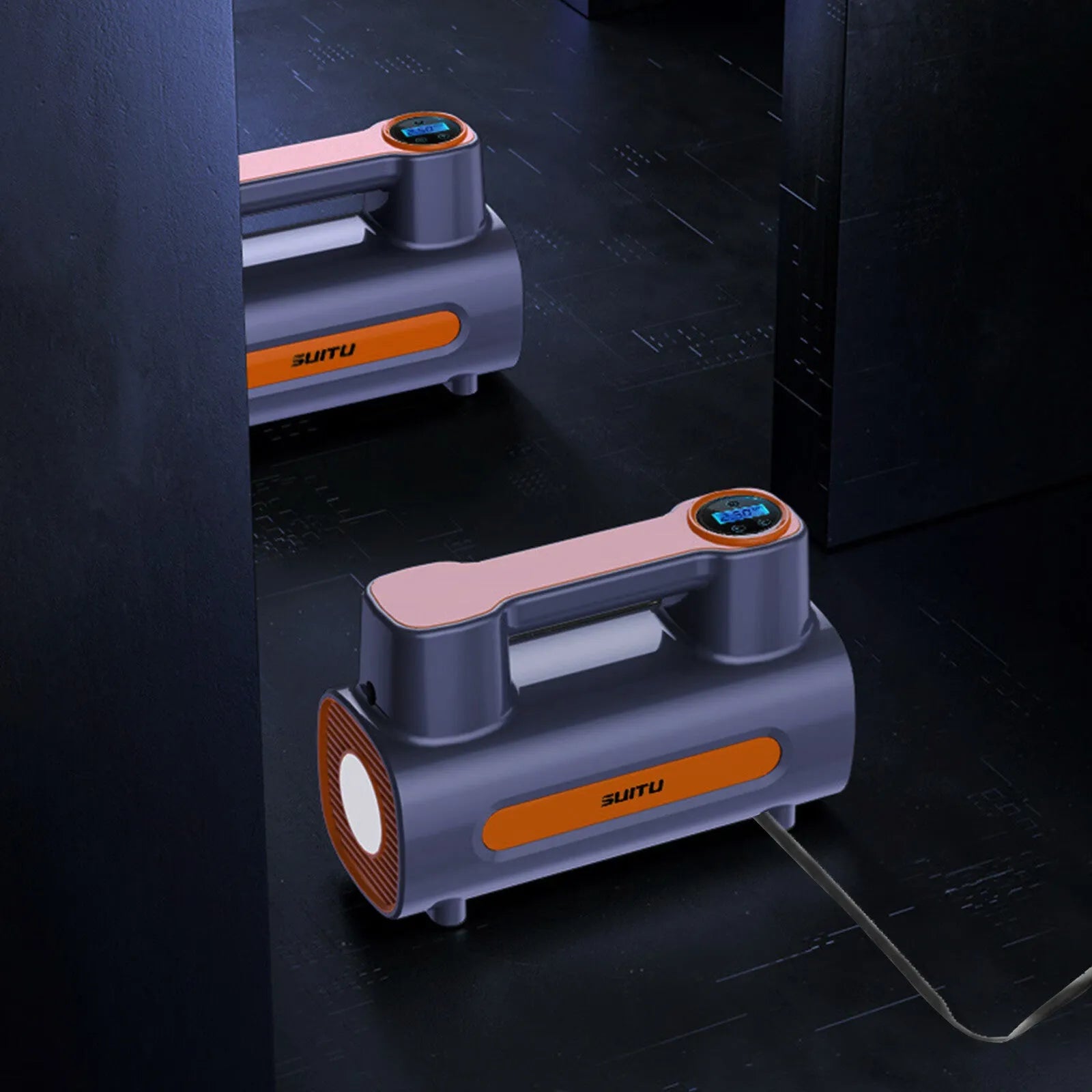 Black portable tyre inflator with digital LCD screen, USB charging port, and built-in battery.