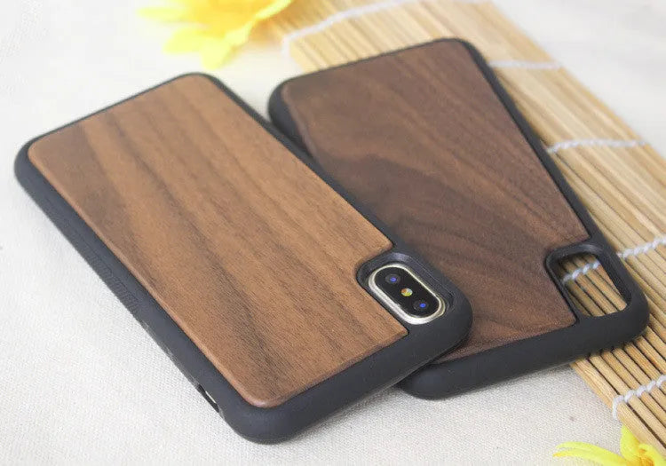 Wooden TPU phone case with carbonised bamboo back and TPU bumper for iPhone, showing textured surface and precise cutouts
