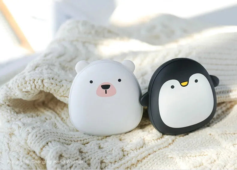 Cartoon penguin polar bear design USB hand warmer showing double-side heating and compact 83x78x35mm dimensions
