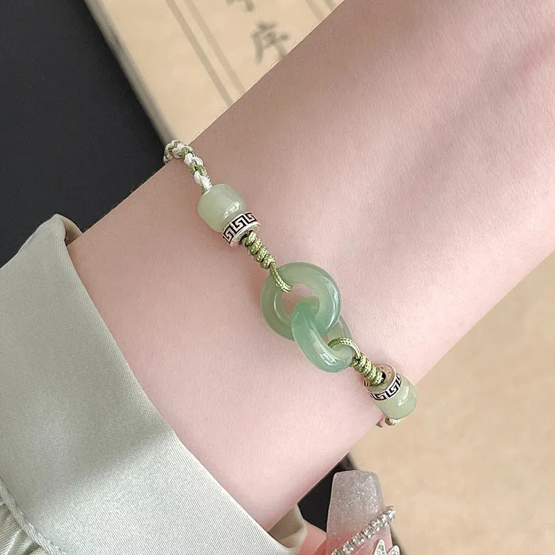Green jade double ring strap bracelet with peace buckle and animal zodiac design in electroplated copper