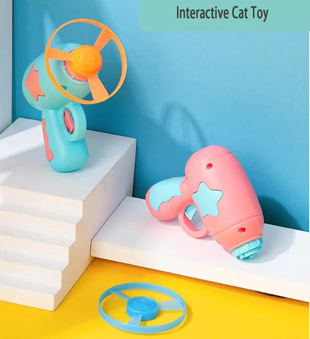 Blue and pink plastic cat toy gun with frisbee measuring 11cm long 10.5cm wide 7.5cm high