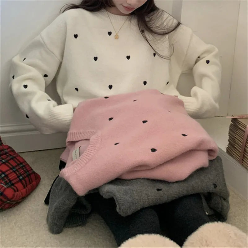 Women's acrylic pullover sweater with embroidery in milky white, loose fit for autumn and winter wear.