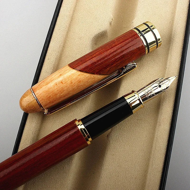 Wooden fountain pen with metal accents and a matching fabric pen bag.
