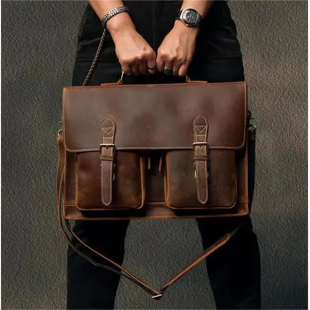Dark brown cowhide leather computer bag with crossbody strap and anti-theft features