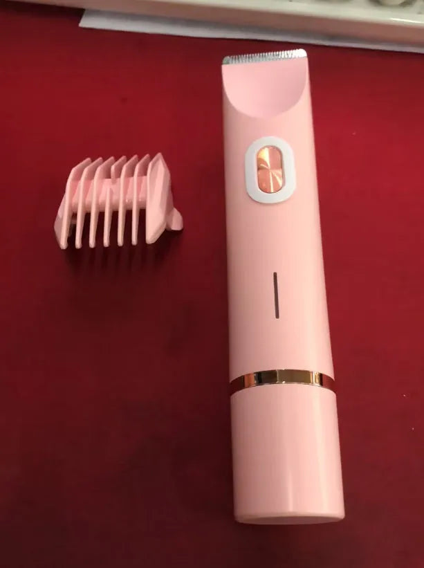 Pink women's electric razor and trimmer with two heads, USB cable, and brush on a white background.