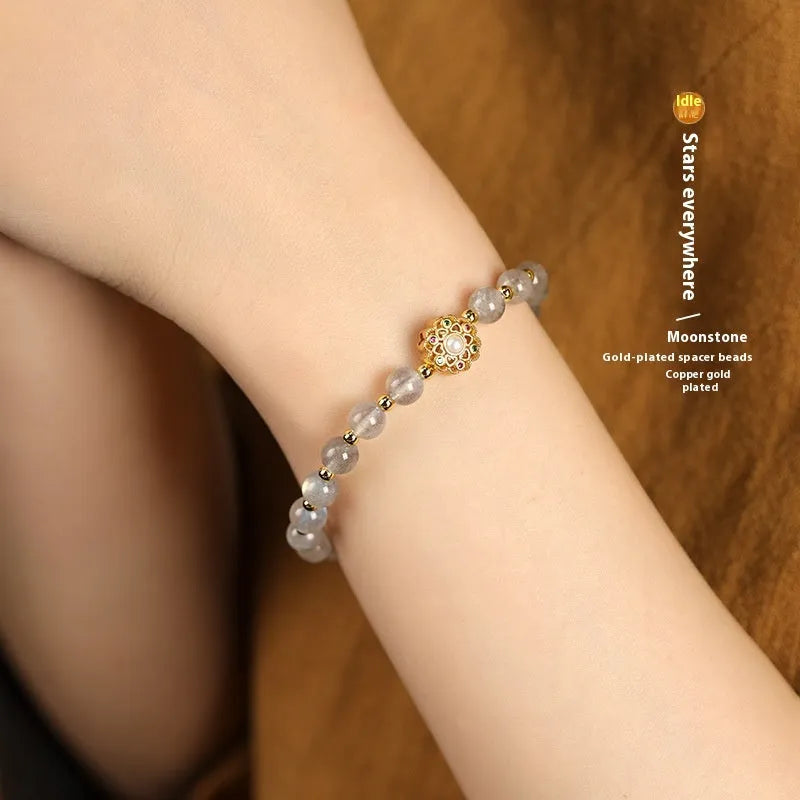 Hand-woven crystal bracelet with grey moonstone, pink sunstone, and peach strawberry quartz 6mm beads