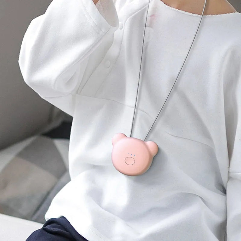 USB mini portable air purifier necklace in blue, showing compact design with USB charging port
