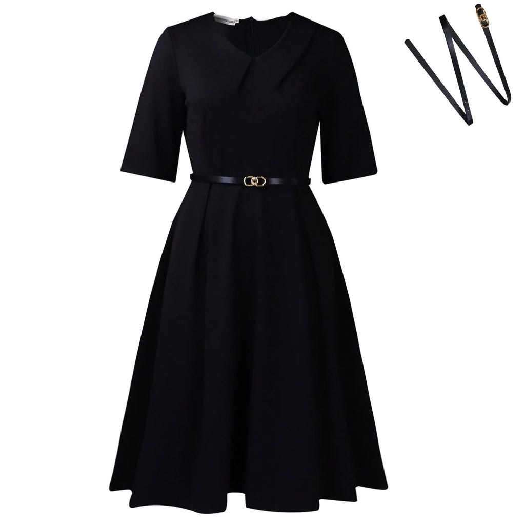 Women's solid colour African dress with high waist, half sleeves, and a matching belt.