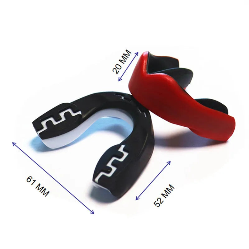 Adult boxing mouthguard with tooth socket design in black/white colour variant showing printed teeth pattern