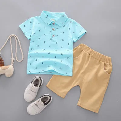 Anchor print children's cotton pullover pants suit in blue, shown flat.
