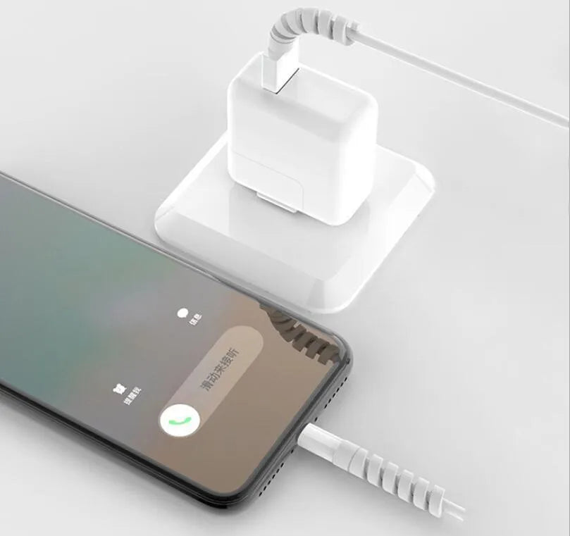 Plastic charging cable protector in assorted colours, measuring 3.5cm long.