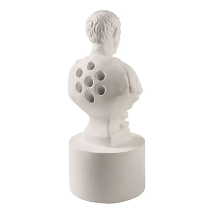 White American character modelling pen holder on desk holding multiple pens, 10cm tall synthetic resin organiser