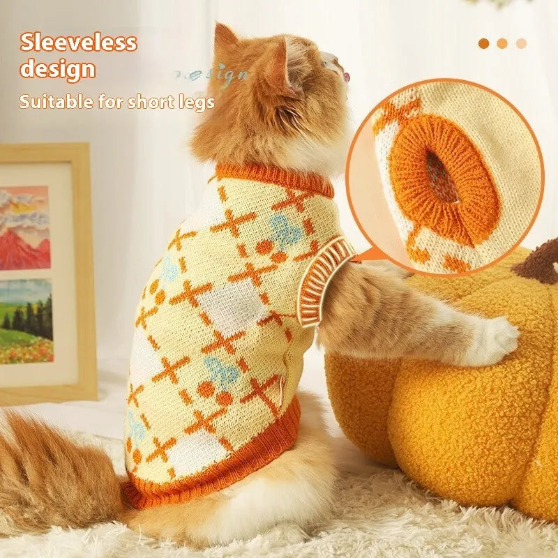 Orange knitted cat sweater with a cherry pattern, sized for small to large cats in autumn and winter.