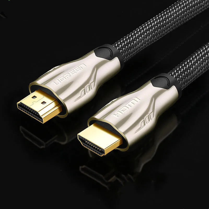 Version 2.0 4K HDMI cable with gold-plated connectors and black PVC jacket showing triple-layer shielding construction