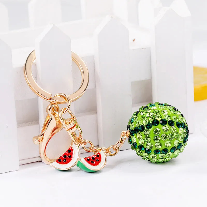 Green watermelon-shaped zinc alloy keychain measuring 12cm with textured surface details