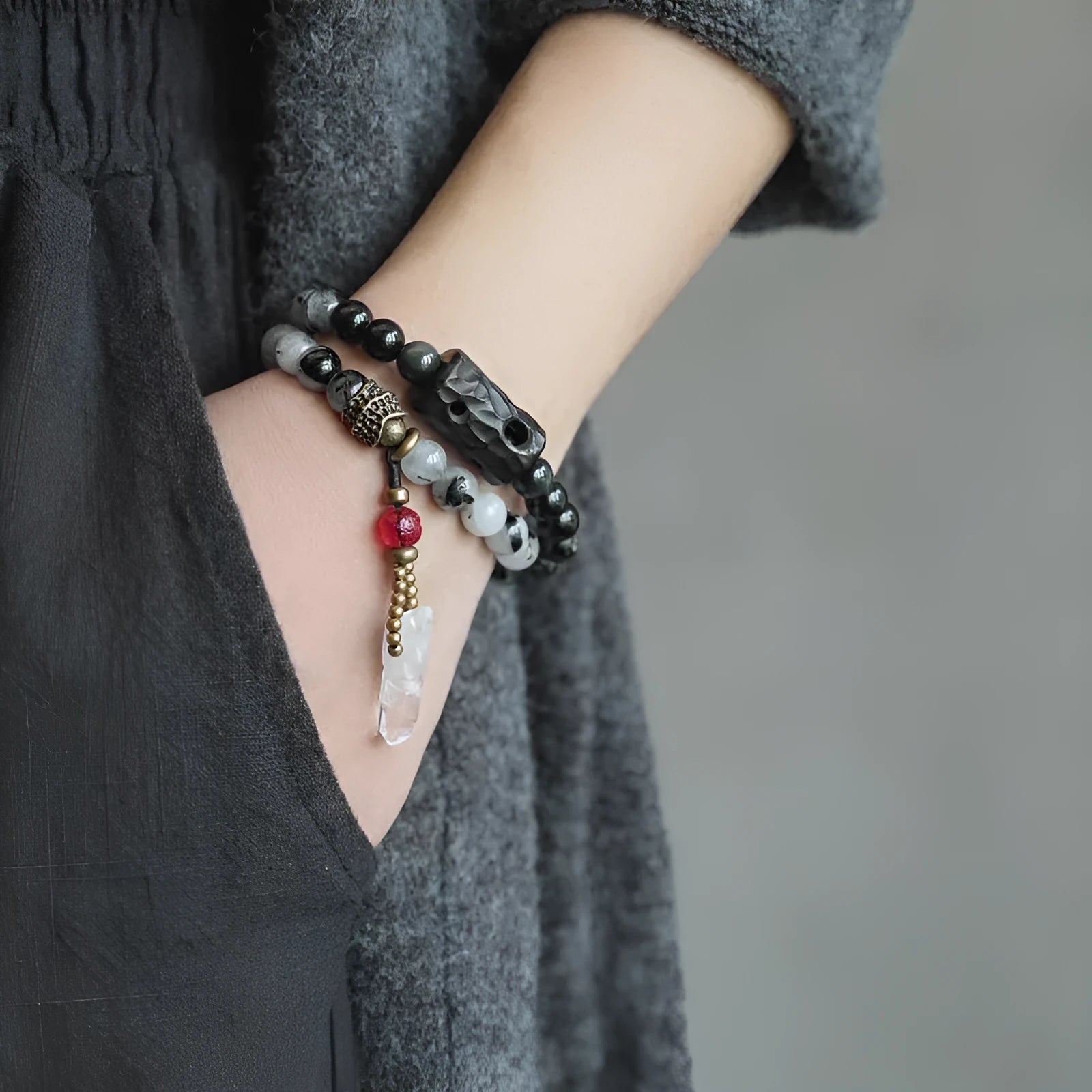 Ethnic black crystal bracelet with white tassels and elastic lacing in four sizes for boys and girls