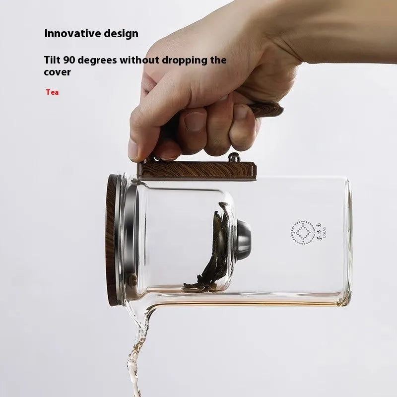 Glass teapot with wooden handle showing magnetic tea separation system and Chinese style design