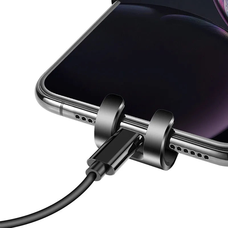 S4 gravity mirror ABS mobile phone bracket attached to car air conditioning vent, holding a smartphone