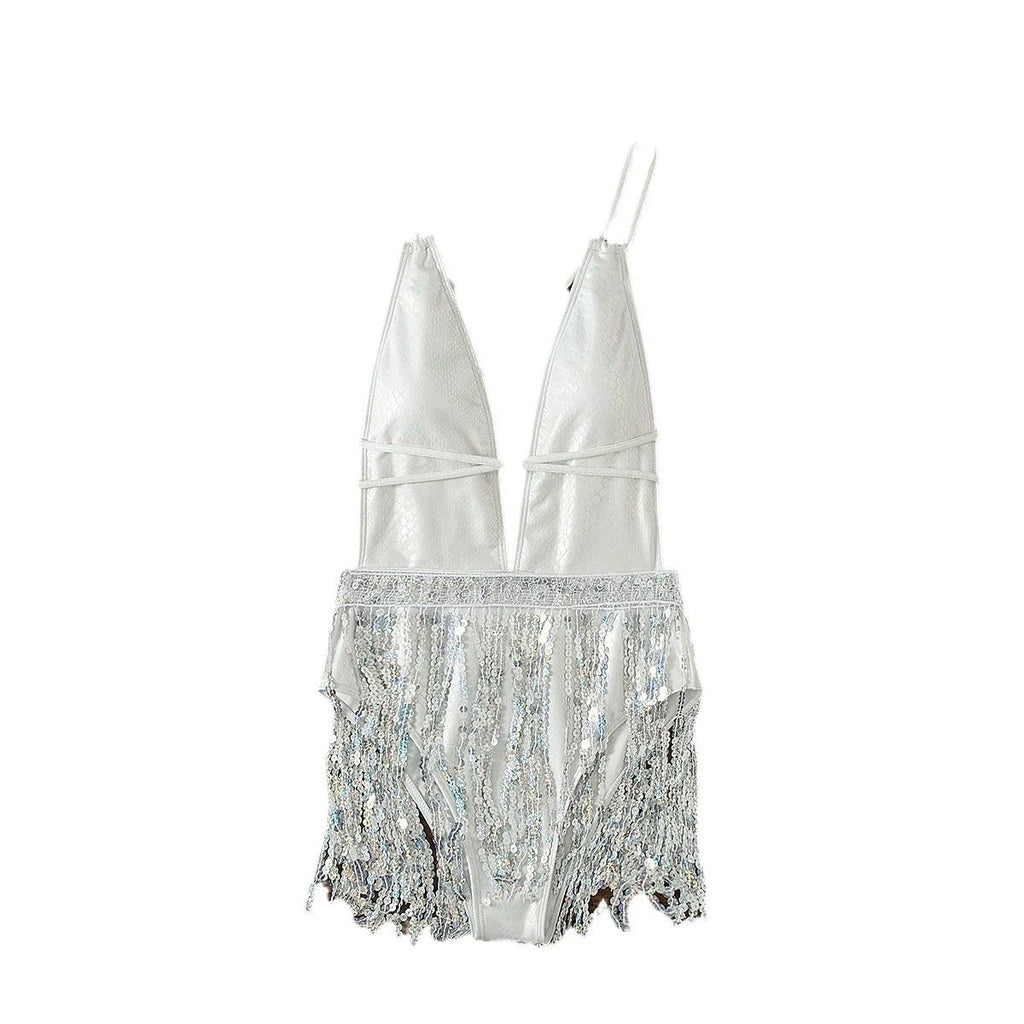White one-piece swimsuit with deep V-neck, adjustable halter straps, and a long front tassel.
