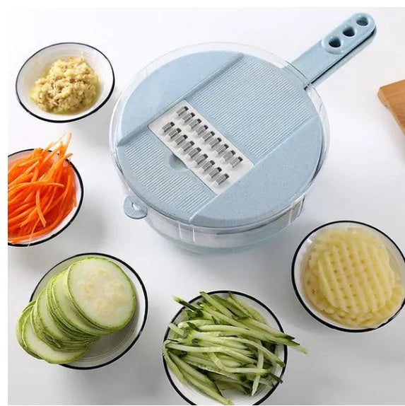 Blue hand-held mandoline slicer with stainless steel blades and plastic container for vegetable preparation