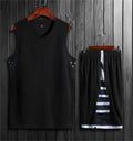 Unisex white and black polyester sports vest and pants set for basketball and training.