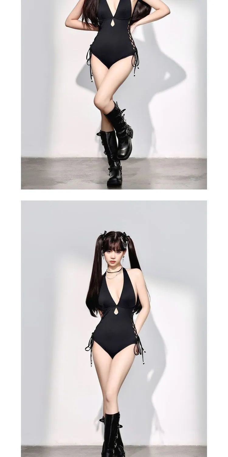 Black women's one-piece swimsuit with V-neck and hollow strap design on a mannequin