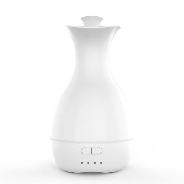 White ultrasonic aromatherapy humidifier with colourful LED night light and 200ml water tank capacity
