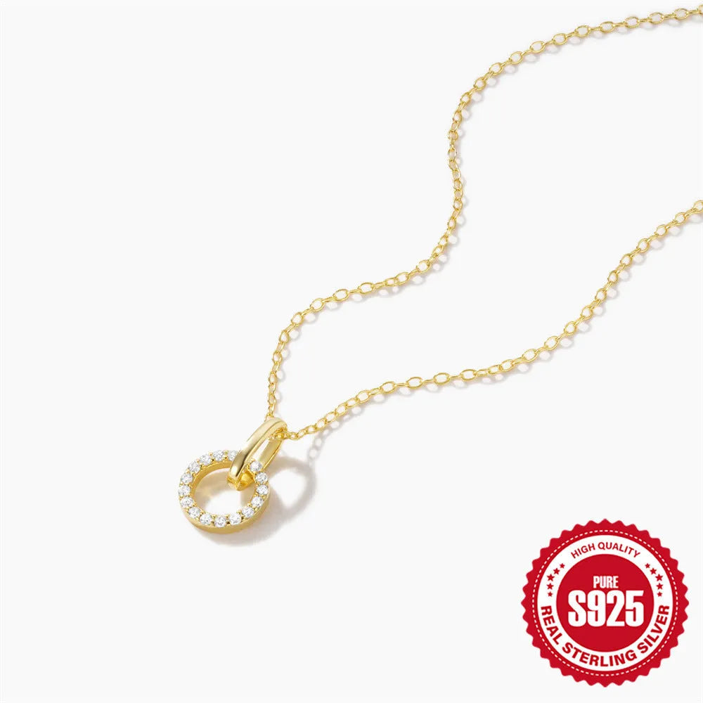 Gold colour geometric interlocking zircon pendant on an adjustable S925 sterling silver clavicle chain.