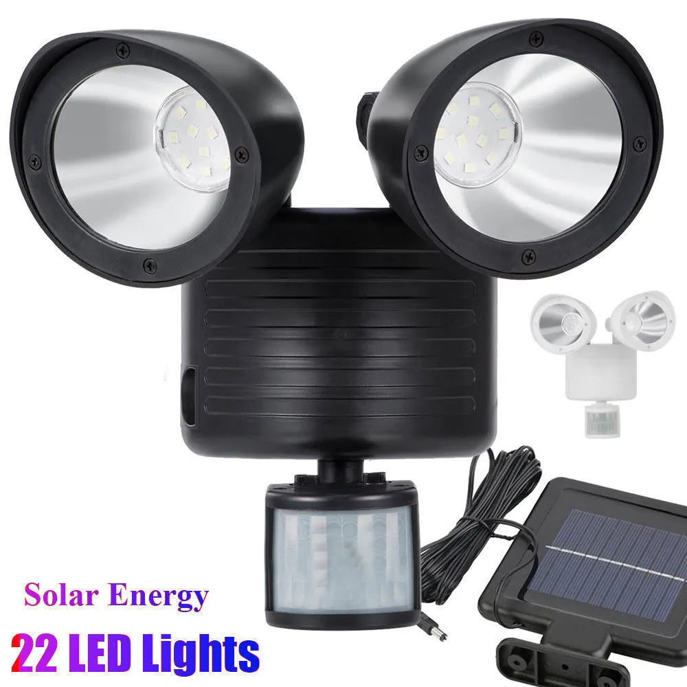 Black and white dual head solar motion sensor spotlight for outdoor security lighting