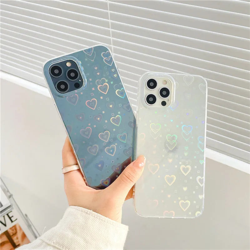 Laser-etched love design on transparent silicone iPhone case showing precise port cutouts