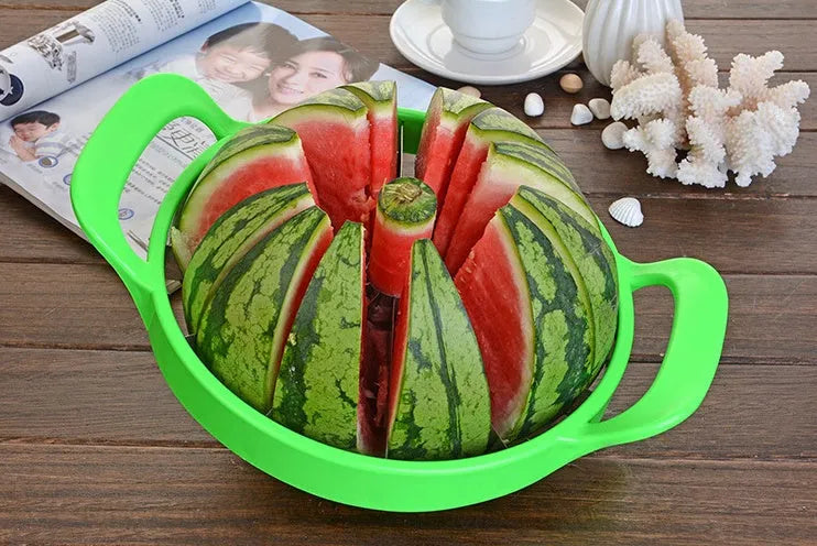 Green plastic and stainless steel melon slicer tool on a kitchen counter.