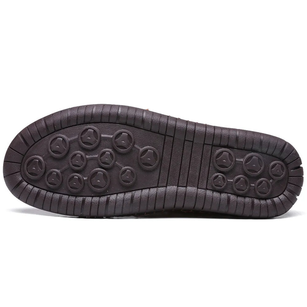 Men's leather mid-top work boots in various colours with lace-up front and rubber sole