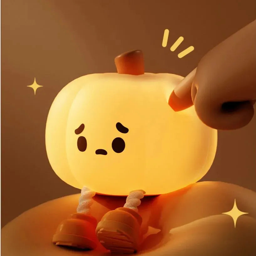 Soft silicone pumpkin night light with USB rechargeable battery and touch dimming controls