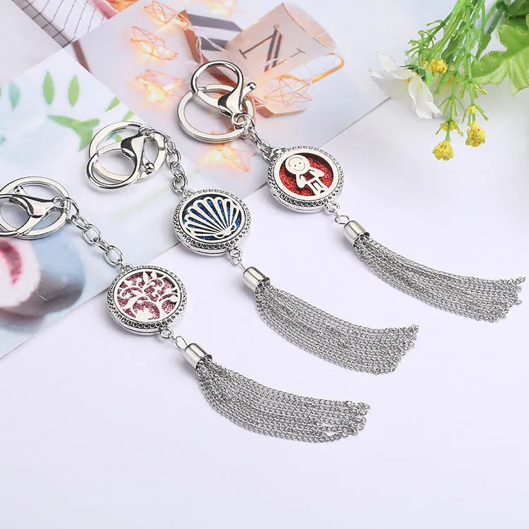 Alloy aromatherapy car pendant diffuser with tassel design and cotton pads for vehicle scenting