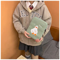 Blue cotton tablet case with embroidered cartoon duck design and zipper closure for device protection