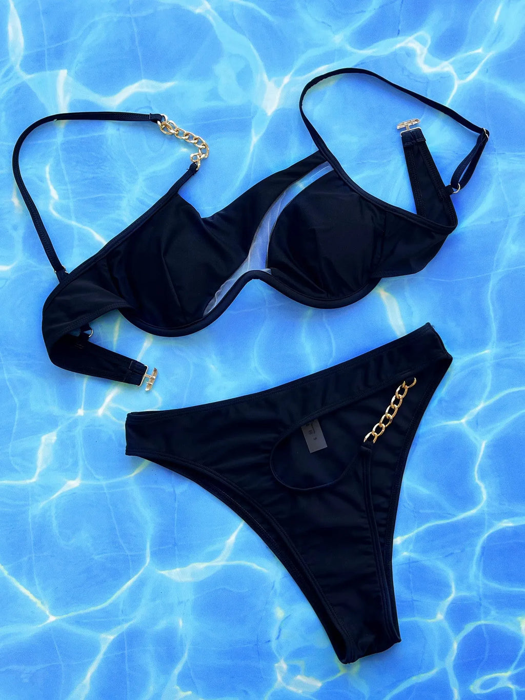 Black women's hollow split swimsuit with nylon fabric top and bottoms