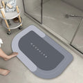 Blended fabric floor mat in blue, green, light grey, or dark grey, in oval or rectangular shape.