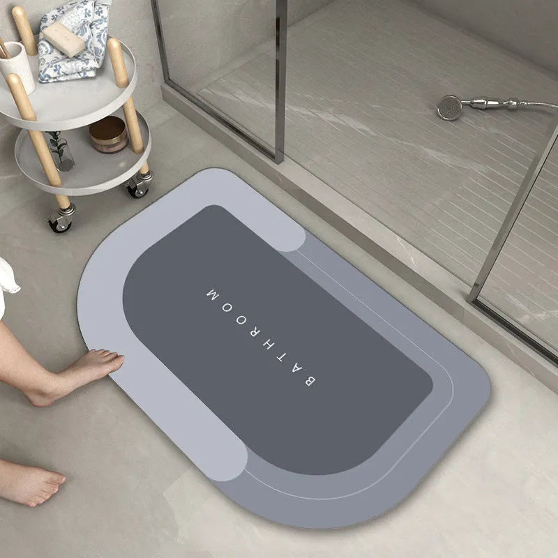 Blended fabric floor mat in blue, green, light grey, or dark grey, in oval or rectangular shape.