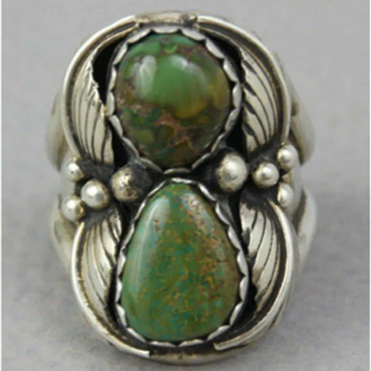 Geometric turquoise ring with electroplated alloy construction showing stone setting detail