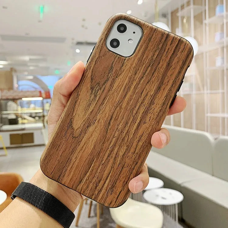 Slim 0.8mm wood phone case in rosewood colour for iPhone showing natural grain texture