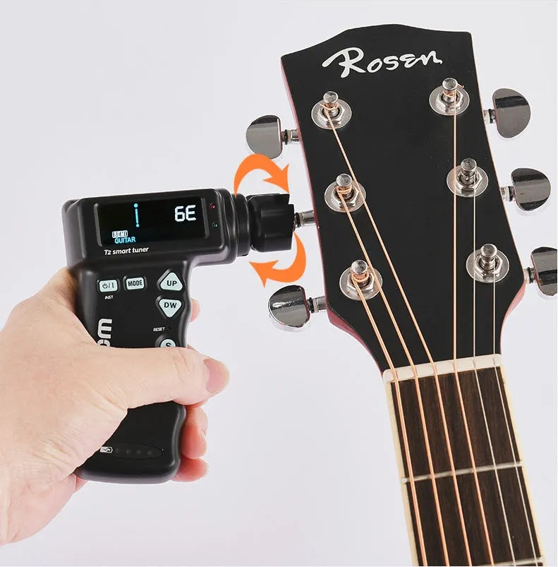 Black and white multi-function smart guitar tuner and electric string winder with LCD display.