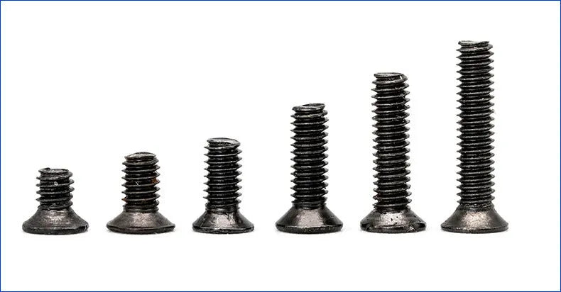 Black carbon steel countersunk head machine screws for laptop repair, 1.4mm diameter.